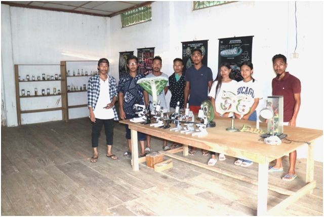 Members of NSU with Zenwang Konyak at the science museum and lab at Nangtan village. (Photo Courtesy: NSU)